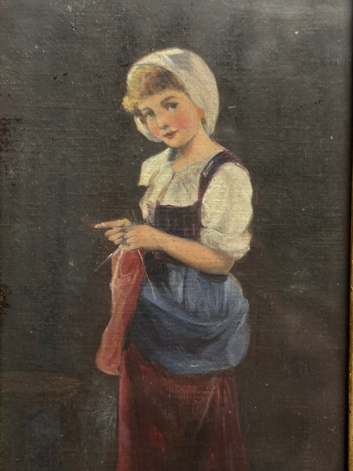 Leányka piros kendővel