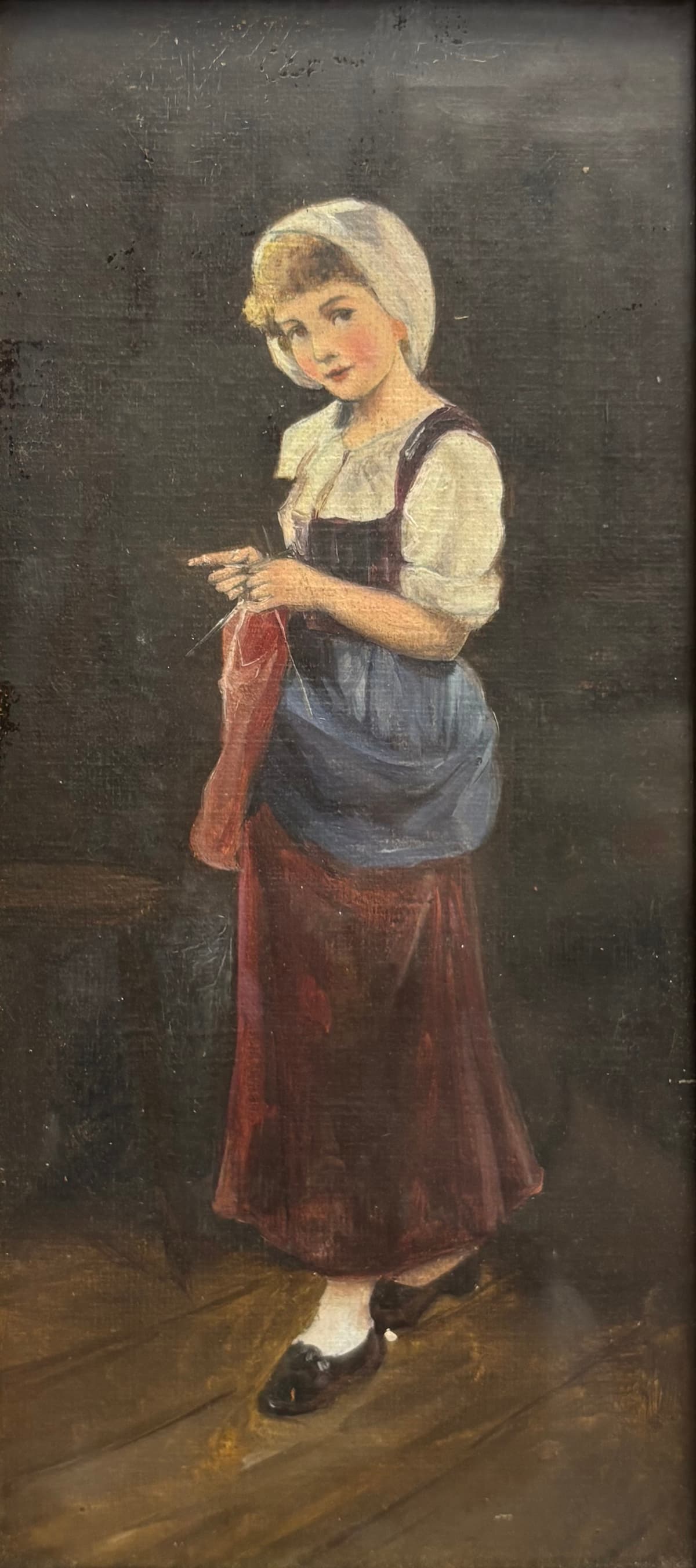 Leányka piros kendővel