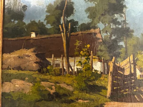 Sunlit homestead at the edge of the village