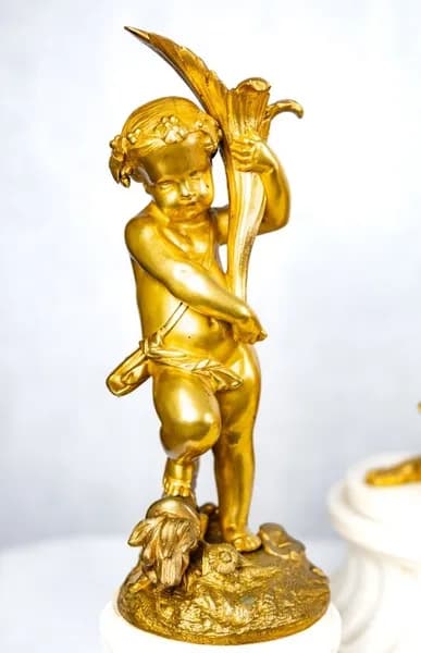 Three piece mantle clock set gilded bronze and white marble base, 19th century