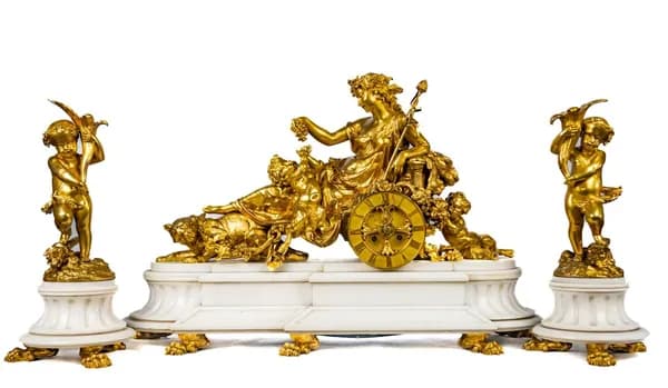 Three piece mantle clock set gilded bronze and white marble base, 19th century