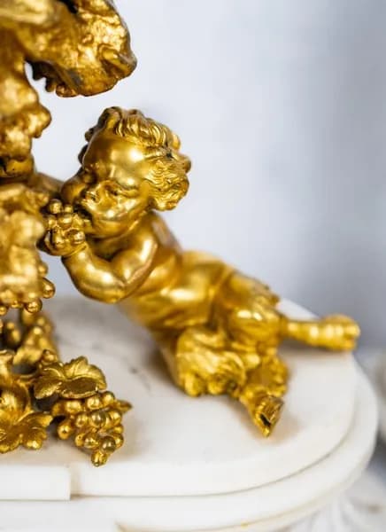 Three piece mantle clock set gilded bronze and white marble base, 19th century