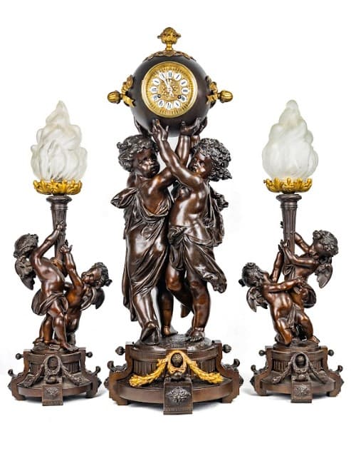 'Cherubs Carrying Time' három darabos óra szett 19.század