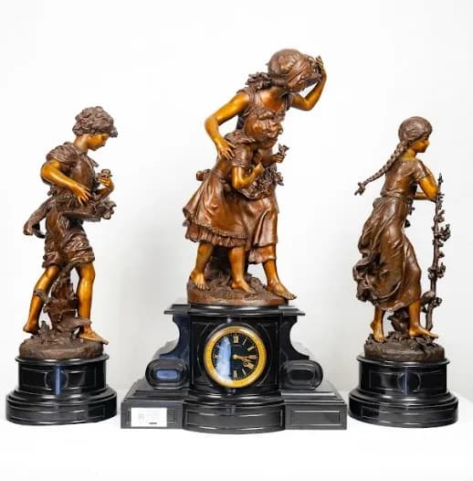Hyppolite Francois Moreau three piece bronze patinated metal clock set late 19th century, early 20th century