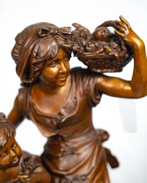 Hyppolite Francois Moreau three piece bronze patinated metal clock set late 19th century, early 20th century