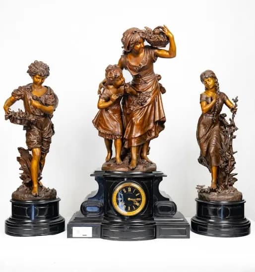 Hyppolite Francois Moreau three piece bronze patinated metal clock set late 19th century, early 20th century