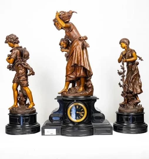 Hyppolite Francois Moreau three piece bronze patinated metal clock set late 19th century, early 20th century