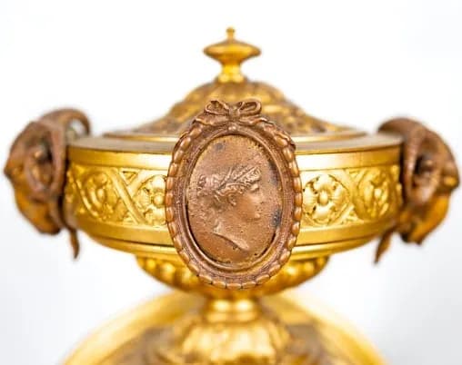 Three piece mantle clock set, gilded and patinated metal