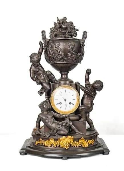 Patinated metal clock early 20th century