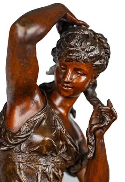 Bronze patinated metal clock on marble base - Woman and Putto with mirror, early 20th century