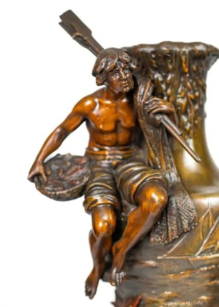 Three piece patinated metal clock set  Moreau 'Le Commerce'