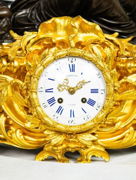 Fire-gilt mantel clock by Raingo Frères