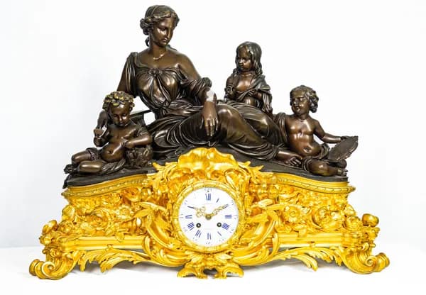 Fire-gilt mantel clock by Raingo Frères