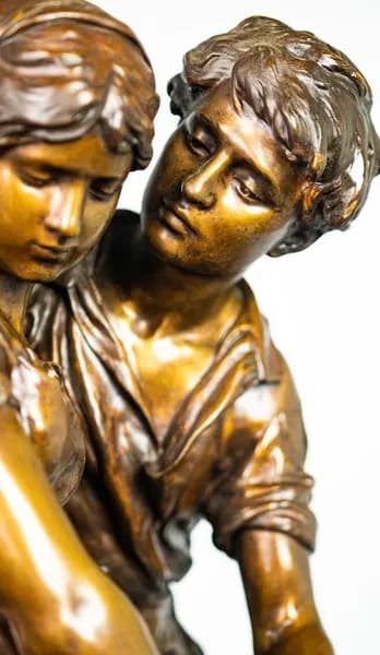 Bronze sculpture of a young couple
