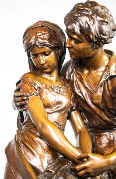 Bronze sculpture of a young couple