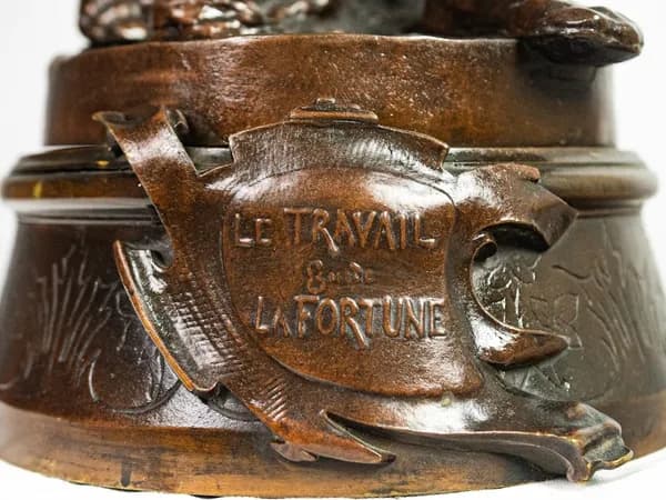 Bronze sculpture “Le travail guidant la fortune” by Émile Marioton