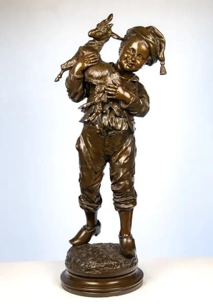 'Young boy with goat'
