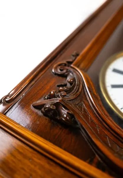 Lechner József carved wall clock with quarter striking, copper mounts, three weights