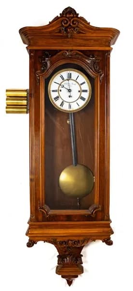 Lechner József carved wall clock with quarter striking, copper mounts, three weights