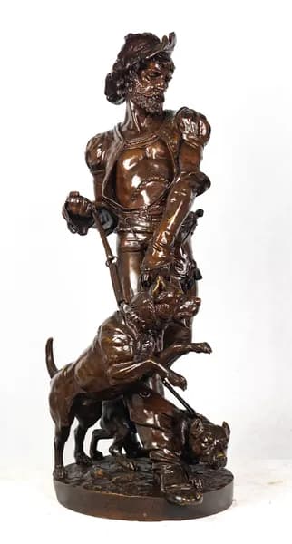 Bronze sculpture of a medieval hunter with dogs