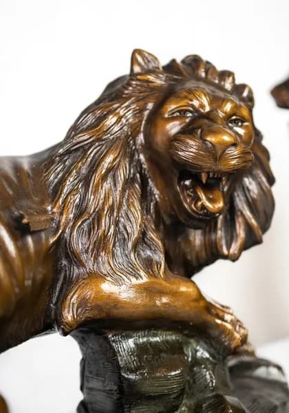Terracotta sculpture “Lion blessé” by André Joliveaux