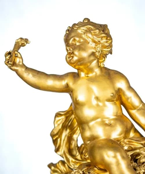 Mantel clock by Lerolle Frères, with three putti