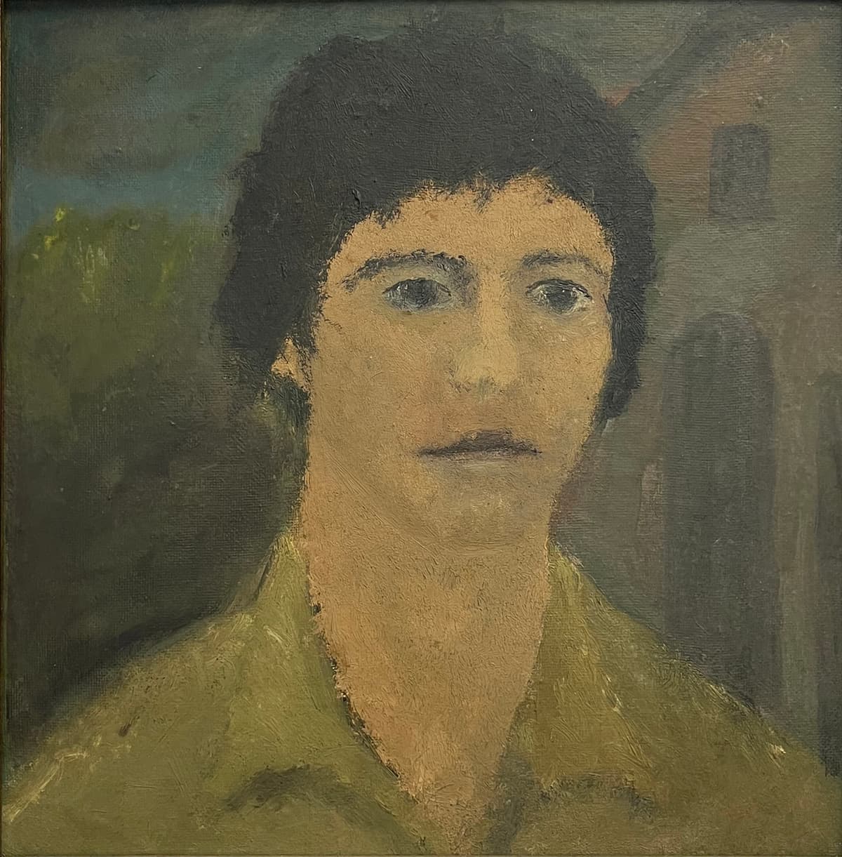 Fiatal férfi portré zöld ingben