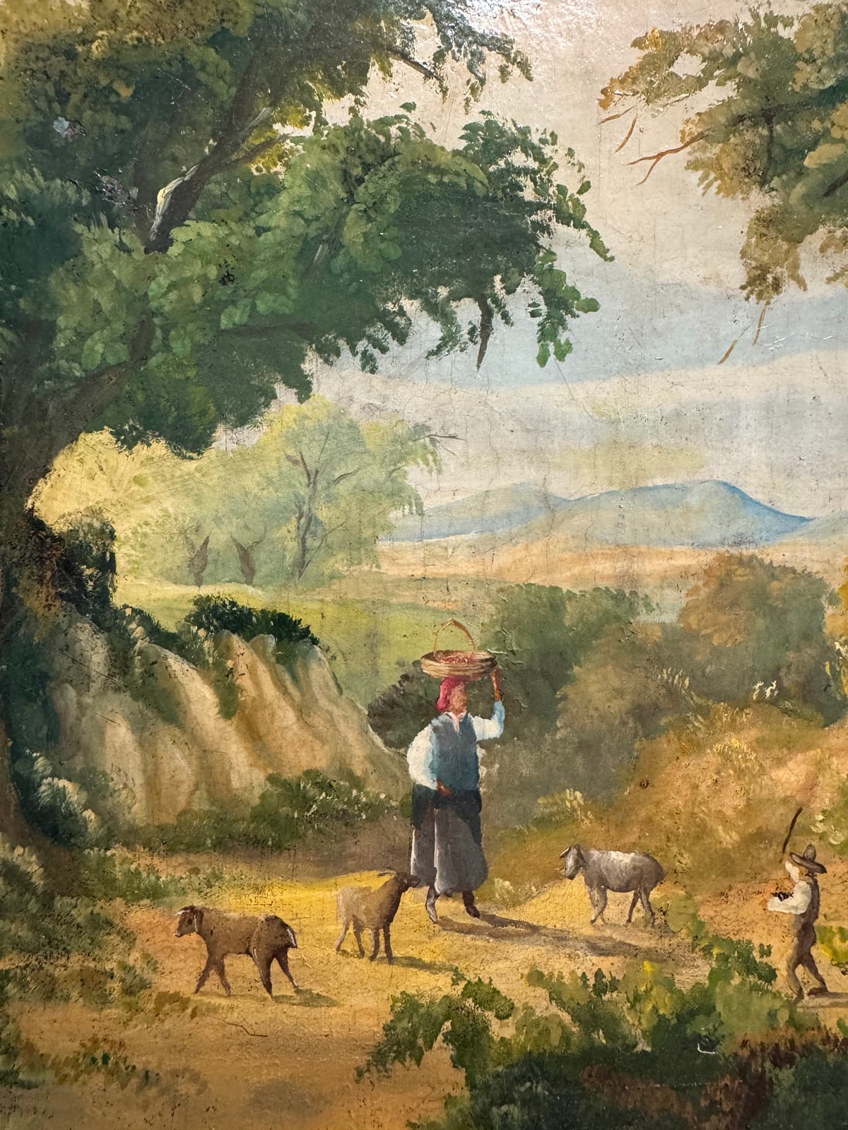 A Woman and Her Sheeps Embraced by the Forest